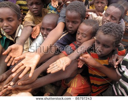 stock-photo-dadaab-somalia-august-unidentified-children-stretch-out-their-hands-at-the-dadaab-refugee-camp-86797243.jpg