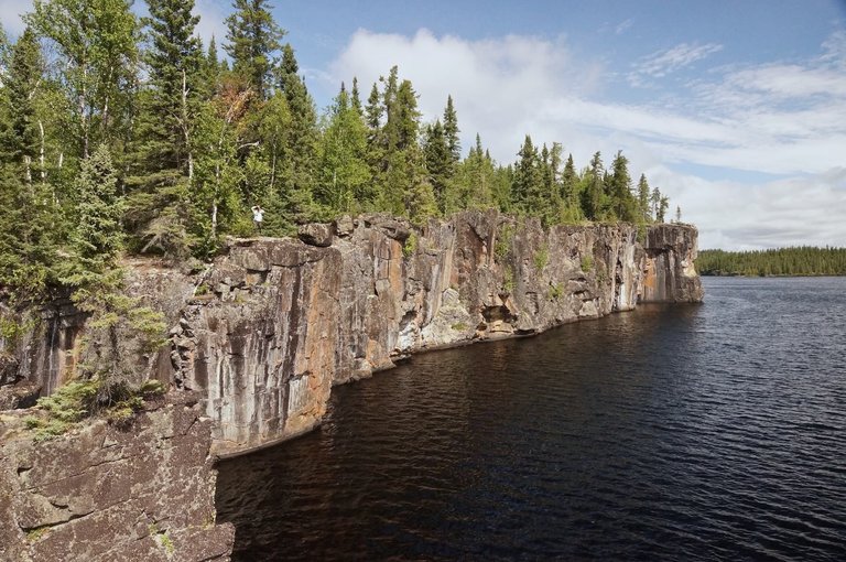 small-stretch-of-cliff-lakes-vertical-rock-face.jpg