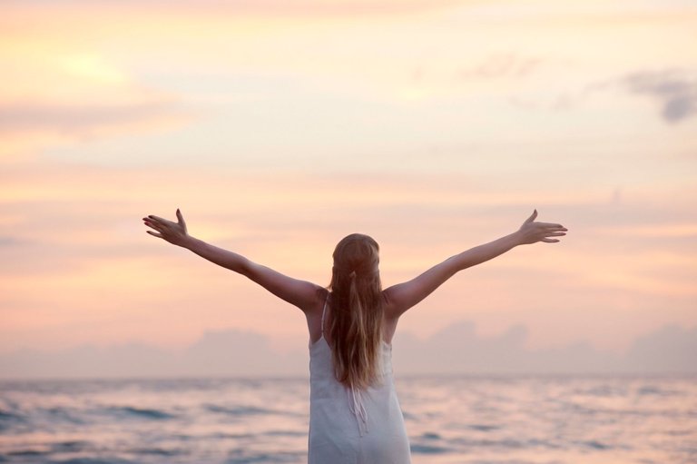 woman in front of beach.jpg