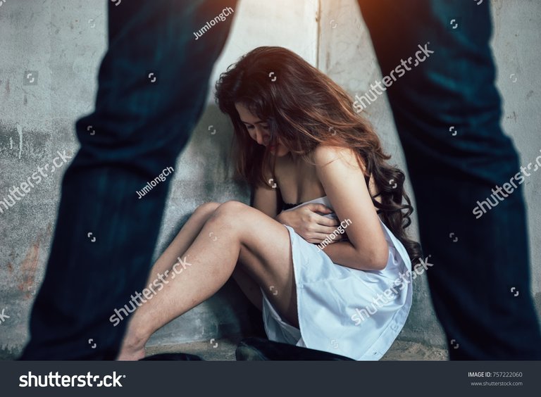 stock-photo-the-thief-was-just-after-raping-women-with-violence-is-done-in-an-abandoned-house-of-one-human-757222060.jpg