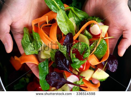 stock-photo-fresh-close-up-vegetable-vegan-salad-in-man-hand-healthy-food-336514598.jpg