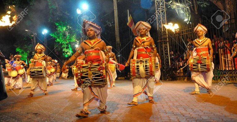 30630278-Kandyan-Drummer-Esala-Perahera-Stock-Photo.jpg