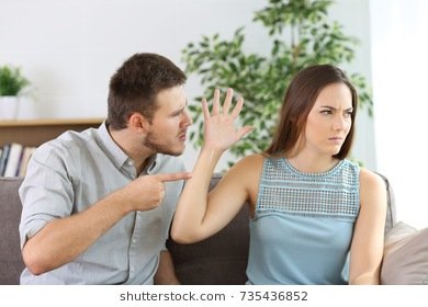 angry-couple-fighting-sitting-on-260nw-735436852.jpg