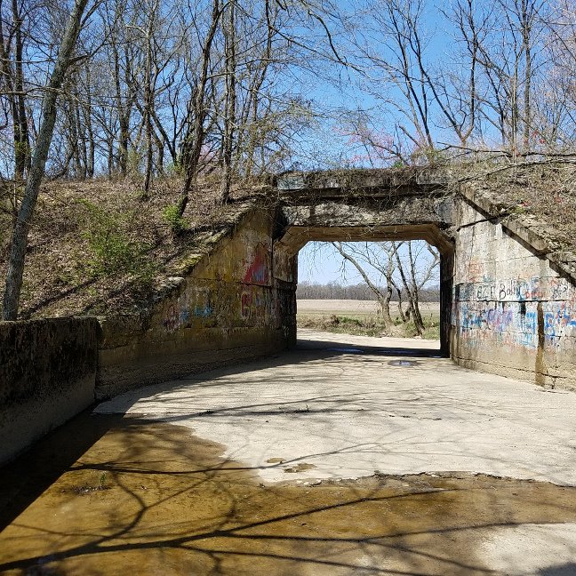 Wide North view of Western rail overpass wall