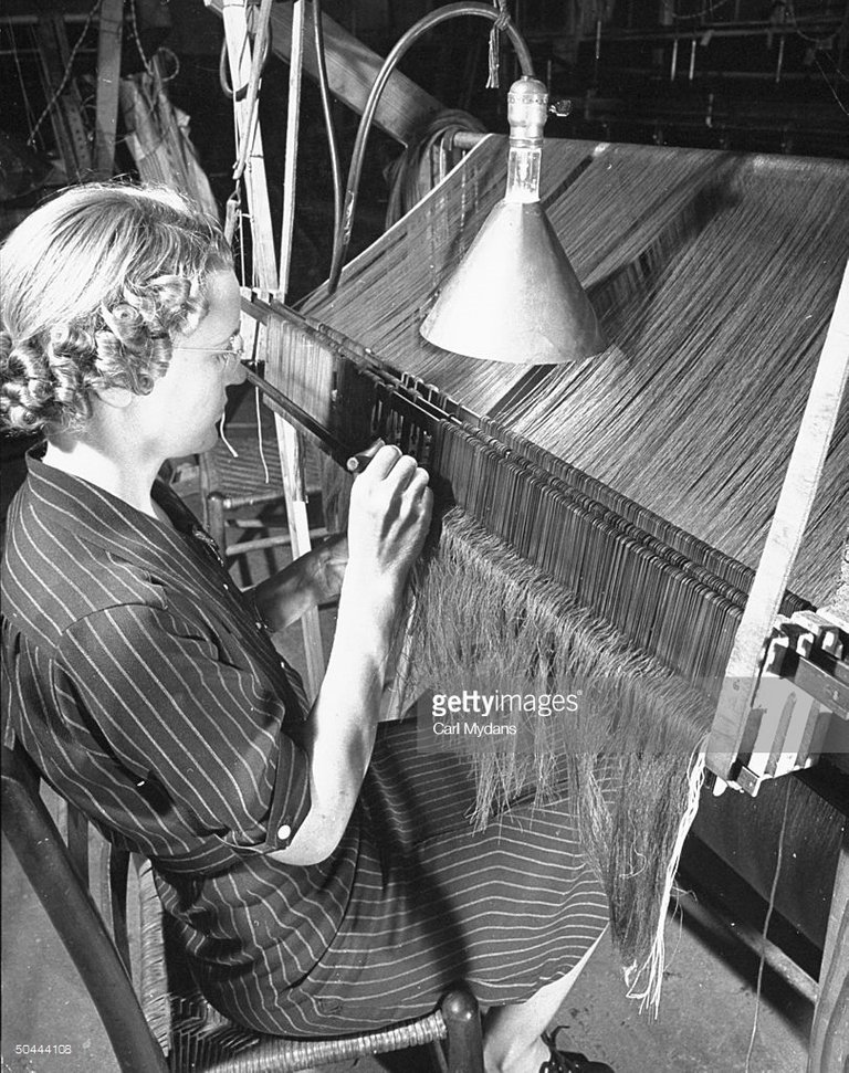 woman-working-in-a-textile-factory-picture-id50444108.jpg