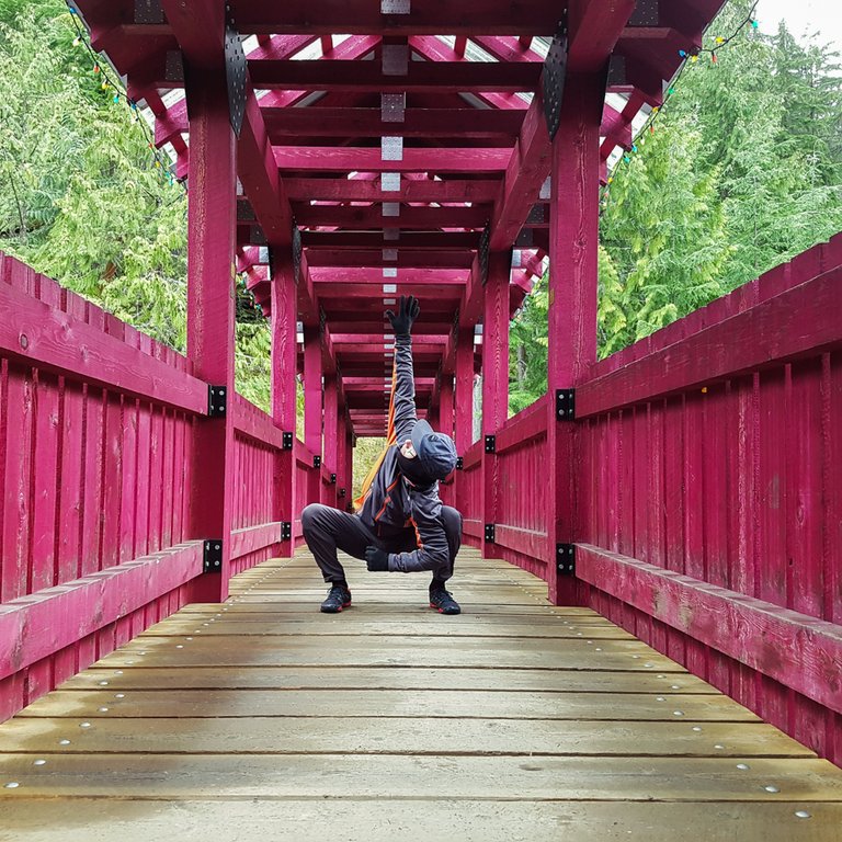 triplonger-matt-stretching-kaslo-bridge.jpg