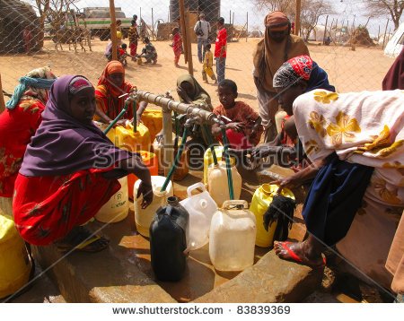 stock-photo-dadaab-somalia-august-unidentified-men-women-children-wait-for-relief-aid-in-the-dadaab-83839369.jpg