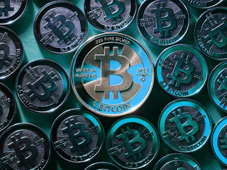 gorgeous-turquoise-bitcoin-coins-wallpaper (1).jpg