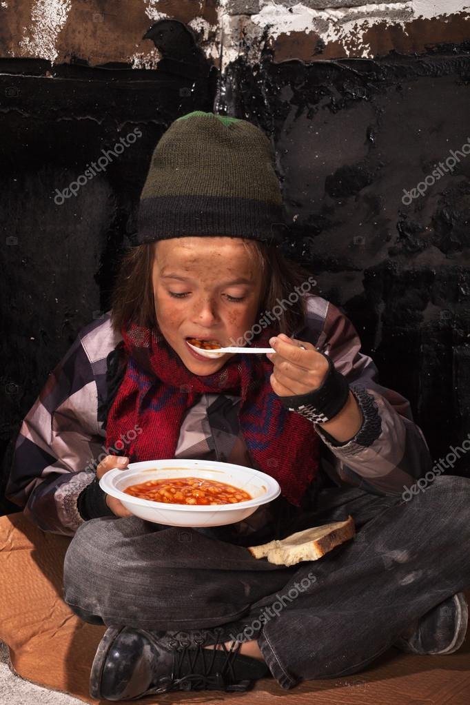 depositphotos_26712341-stock-photo-poor-beggar-child-eating-charity (1).jpg