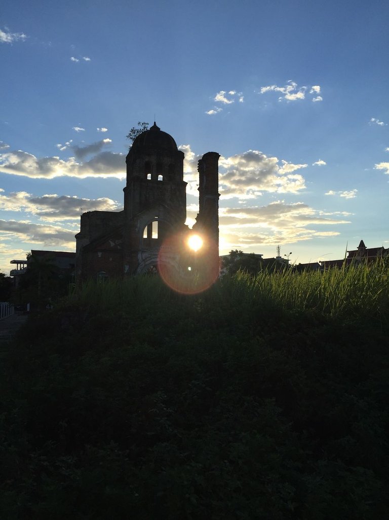 dong hoi sunset through church ruins.jpg