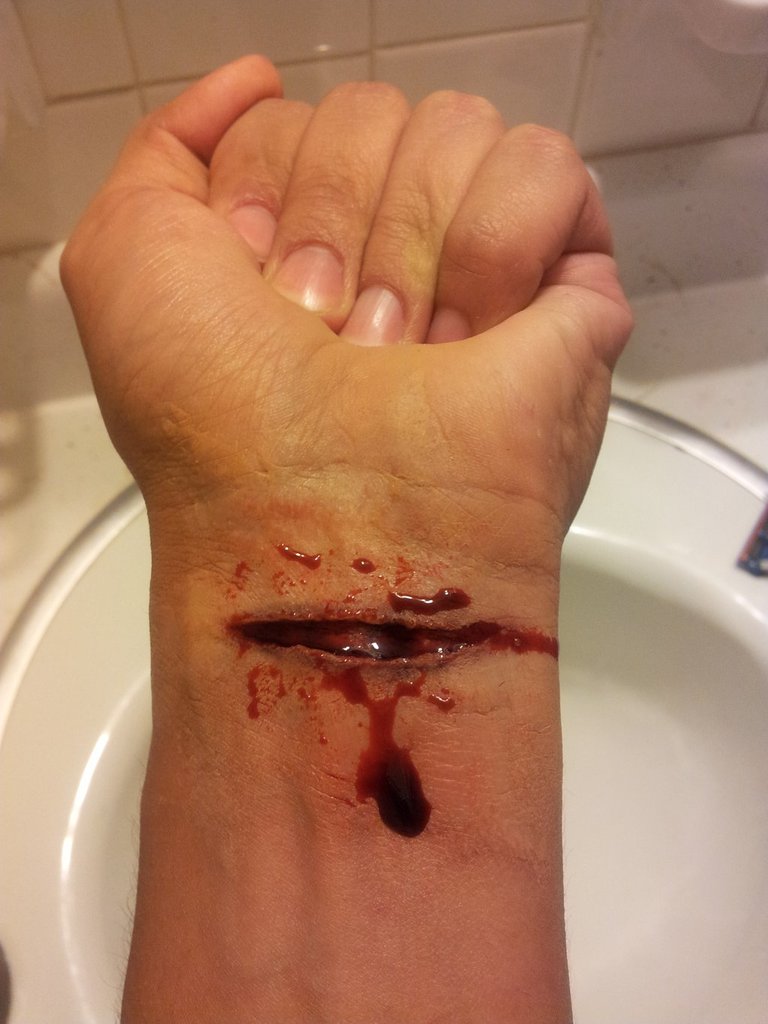 cut_wrist_by_fxjaguar-d71j84h.jpg