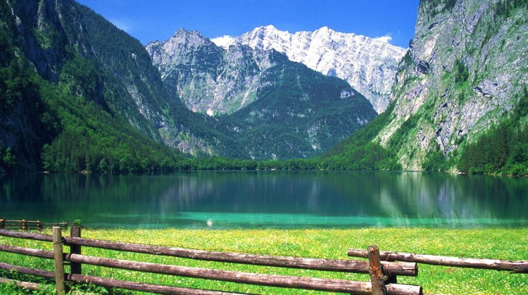 beautiful-nature-lake-wallpaper-16-the-blue-and-clear-river-hard-fences-mountains-around-forbidden.jpg