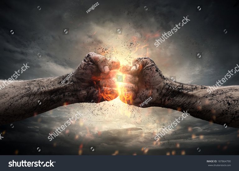 stock-photo-fight-close-up-of-two-fists-hitting-each-other-over-dark-dramatic-sky-187864790.jpg