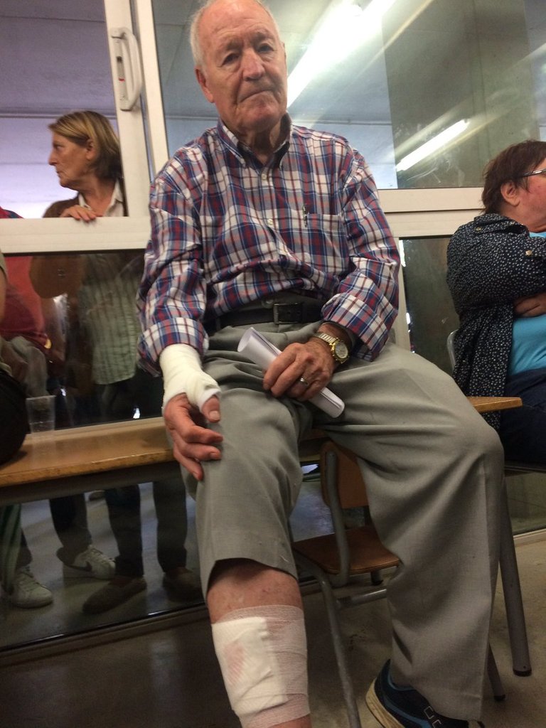 Antonio, 83 yrs old went to vote at 7am. Was attacked by police at 9am. Still waiting to vote six hours later. Says 'Worse than Franco'..jpg