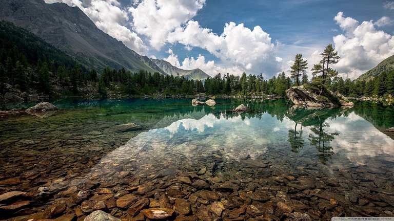 cristal_clear_mountain_lake-wallpaper-1366x768.jpg