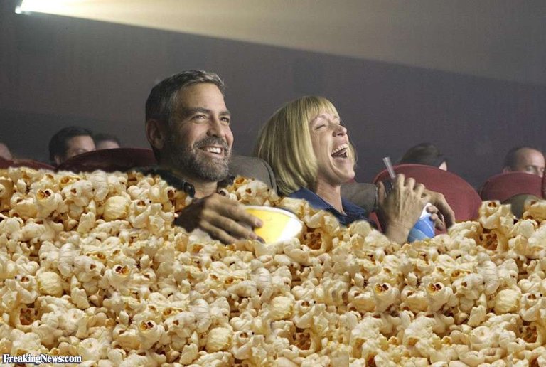 George-Clooney-Eating-Popcorn-at-Movies-64616.jpg