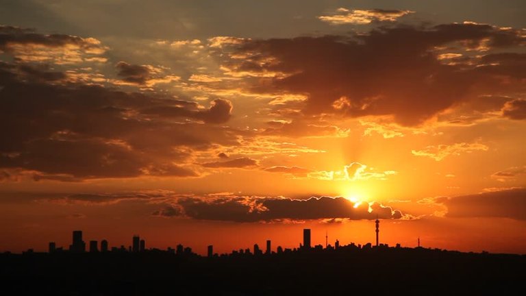 157945746-red-sky-at-night-johannesburg-downtown-skyline-city-silhouette.jpg