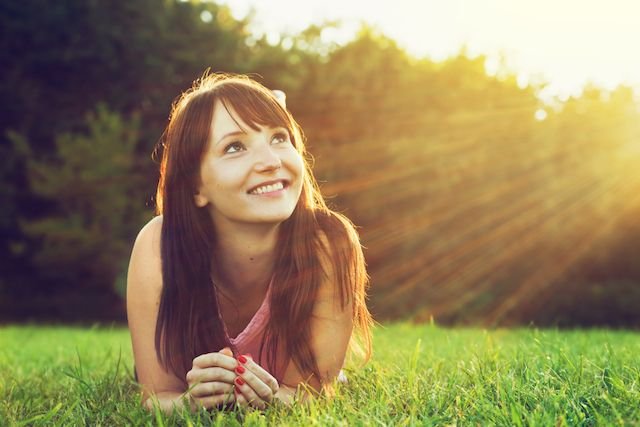 Happy-Woman-on-Grass.jpg