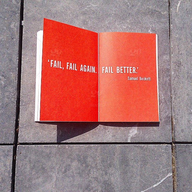 stock-photo-outdoors-red-book-reading-tiles-failure-fail-better-flat-lay-28530ceb-0a66-4aaa-a795-9dbdabfddd27.jpg