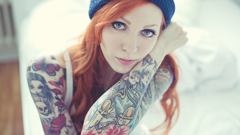 tattoowomenredheadfaceblueeyeswoollyhatevilladark-1520730790130-2048.jpg