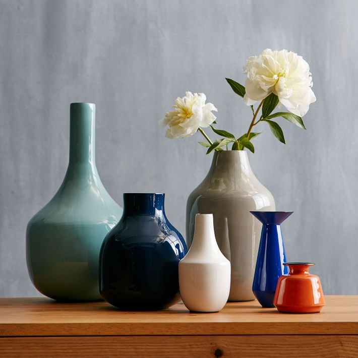 enamel-vases-blue-white-orange-gardenista.jpg