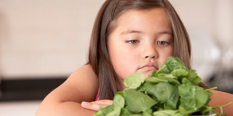 o-KID-EATING-VEGETABLES-facebook.jpg