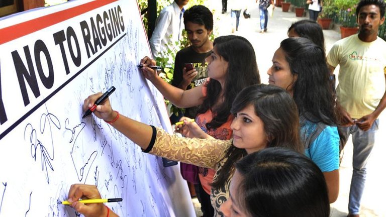 Cover-Photo.-Students-signing-against-ragging.jpg