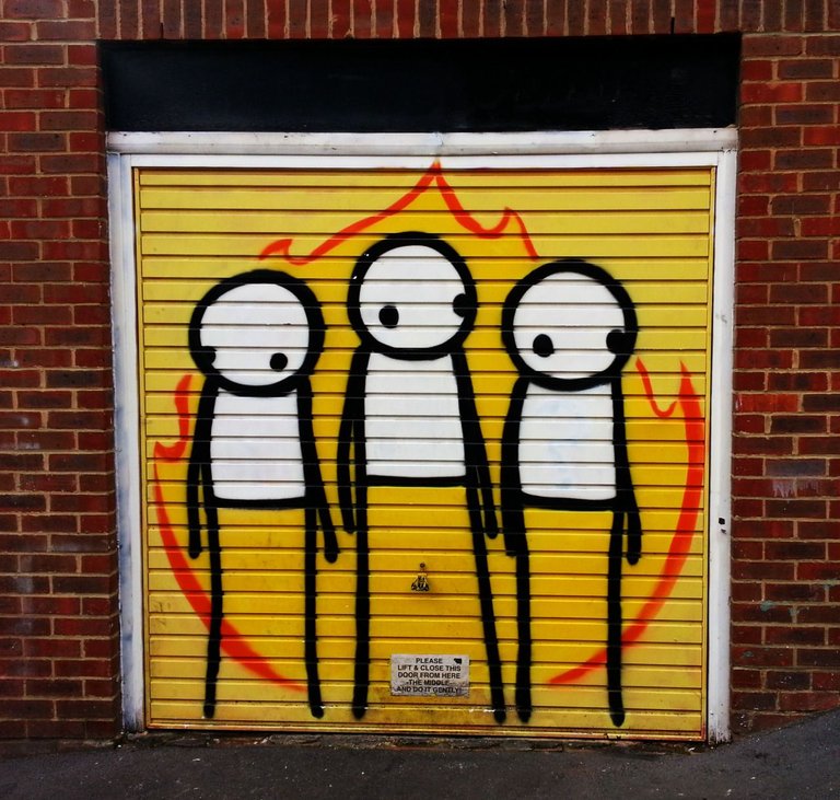 37832406223 - character based street art on garage door.jpg