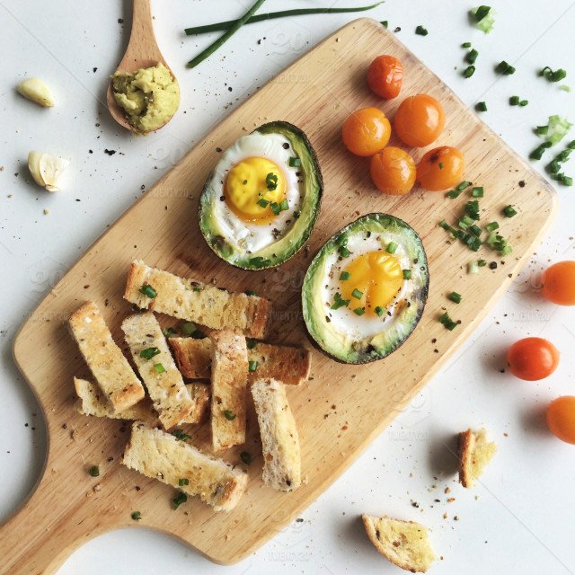 stock-photo-bread-food-wood-tomato-cutting-board-high-angle-edible-avocado-eggs-ee7ba853-bb88-4646-9460-1ebc9ecfef36.jpg