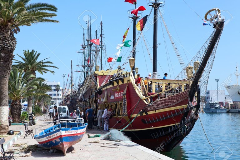 16284620-SOUSSE-TUNISIA-CIRCA-MAY-2012-City-embankment-with-beautiful-vessels-Excursion-style-of-old-ship-on-Stock-Photo.jpg