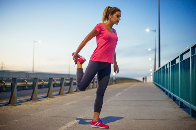 stretching-woman-Drazen-Lovric-CreativeRF-GettyImages-588959736-57b9b2ad3df78c8763924e1e.jpg