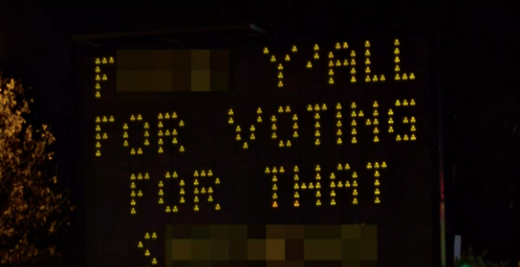 someone-hacked-traffic-sign-anti-trump-message-2.png