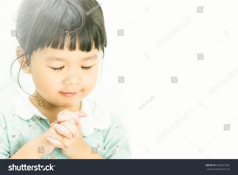 stock-photo-little-girl-praying-in-the-morning-little-asian-girl-hand-praying-hands-folded-in-prayer-concept-602697284.jpg