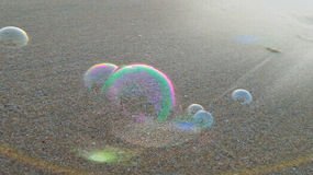 bubbles-beach-rainbow-49284102.jpg