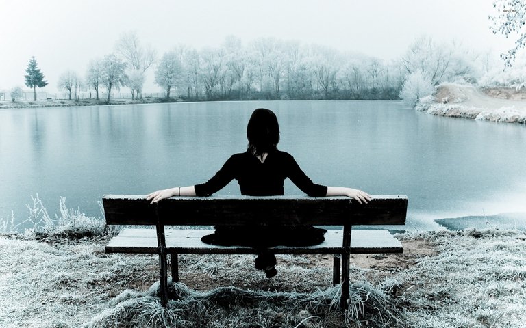 woman-lake-frost-snow-winter-bench.jpg
