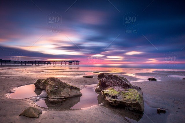 stock-photo-nature-pink-reflection-sunset-beach-sand-blue-landscape-seascape-725471b4-e9c9-4393-8f6f-f5400b8f5308.jpg