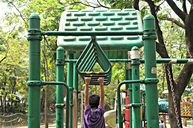 kid playing at the park