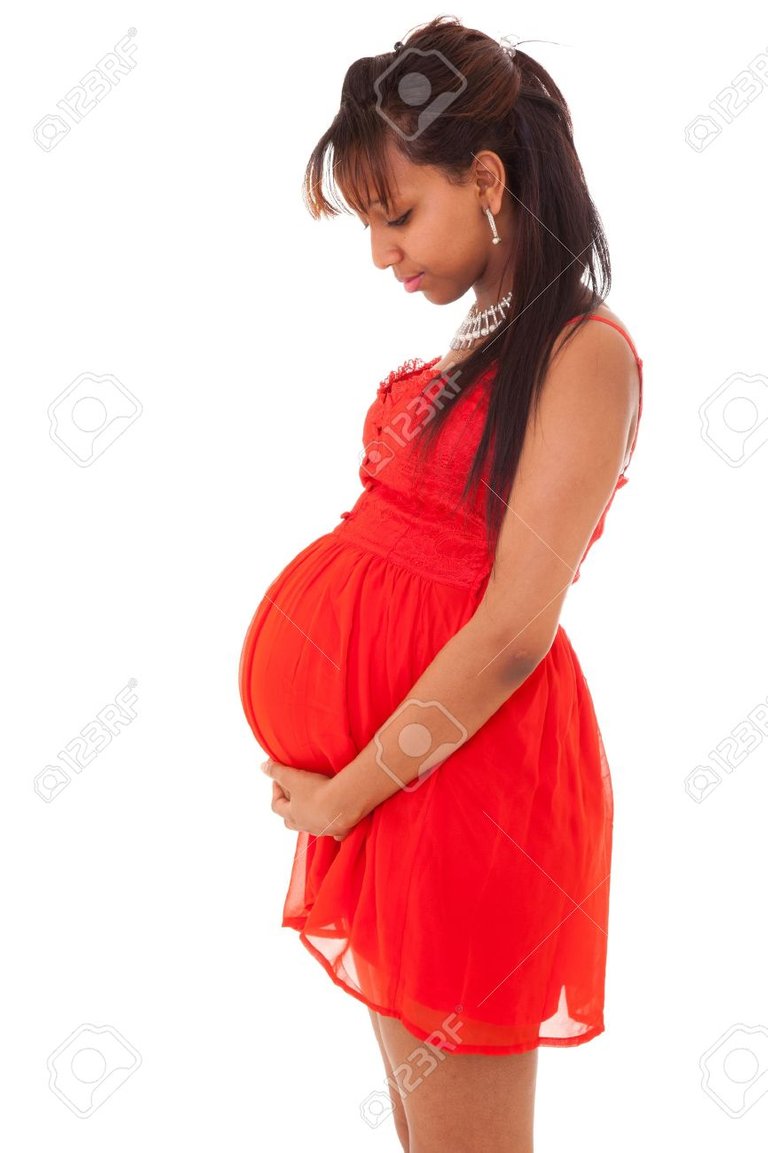 9436947-beautiful-pregnant-young-black-woman-touching-her-belly.jpg