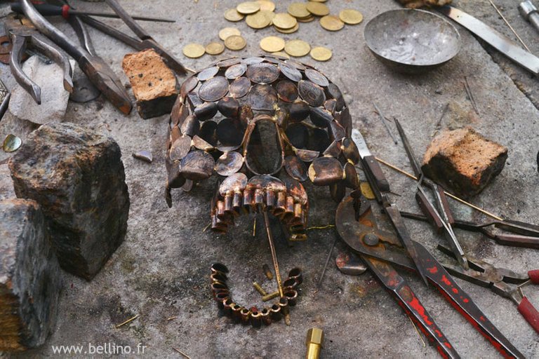 A skull made from coins