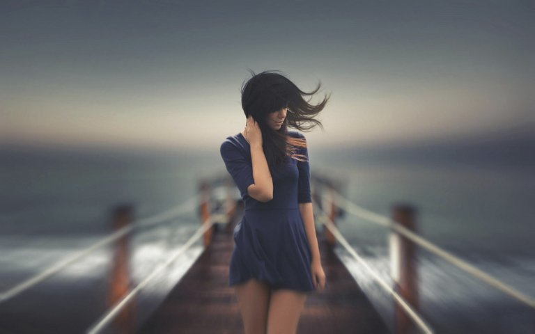 7001684-lovely-girl-wind-sea.jpg