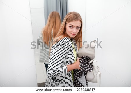 stock-photo-woman-stealing-a-dress-495360817.jpg