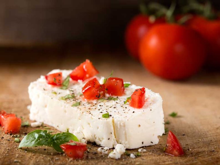 Cheese-with-tomatoes-and-green-basil-leaves.jpg