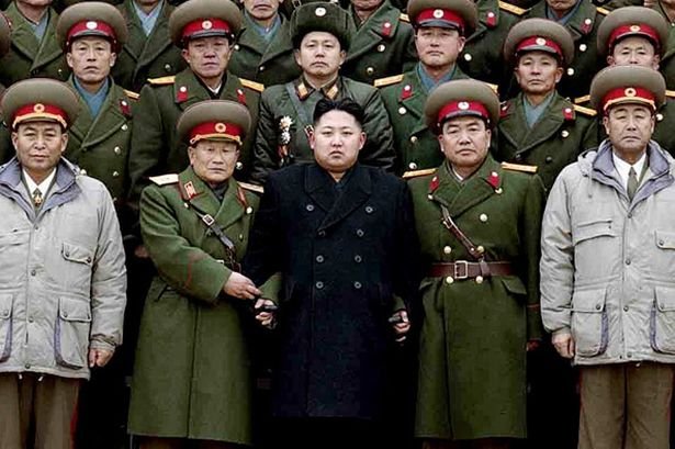 north-korean-leader-kim-jong-un-posing-for-photos-with-soldiers-897615547.jpg