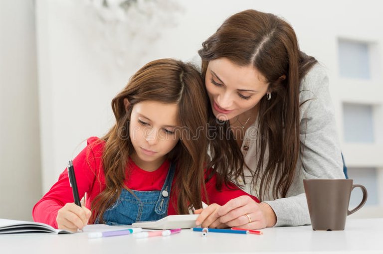 mother-helping-her-daughter-studying-happy-young-home-36972969.jpg
