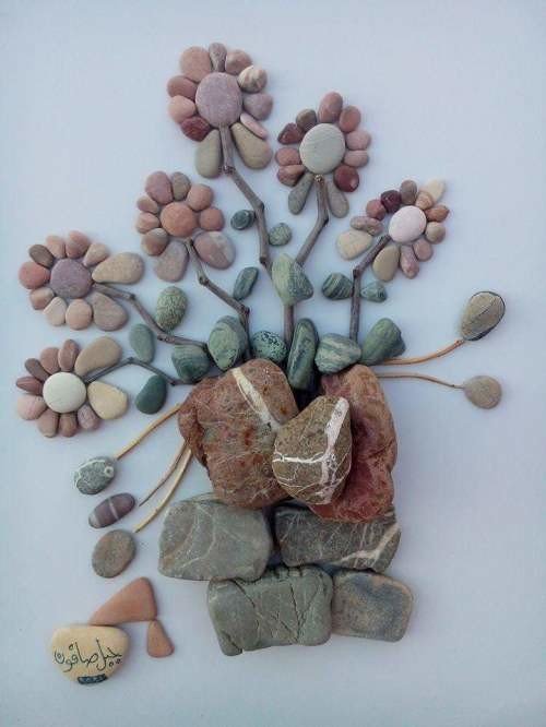 1465196976-pebble-art-by-syrian-sculptor-nizar-ali-badr-3.jpg