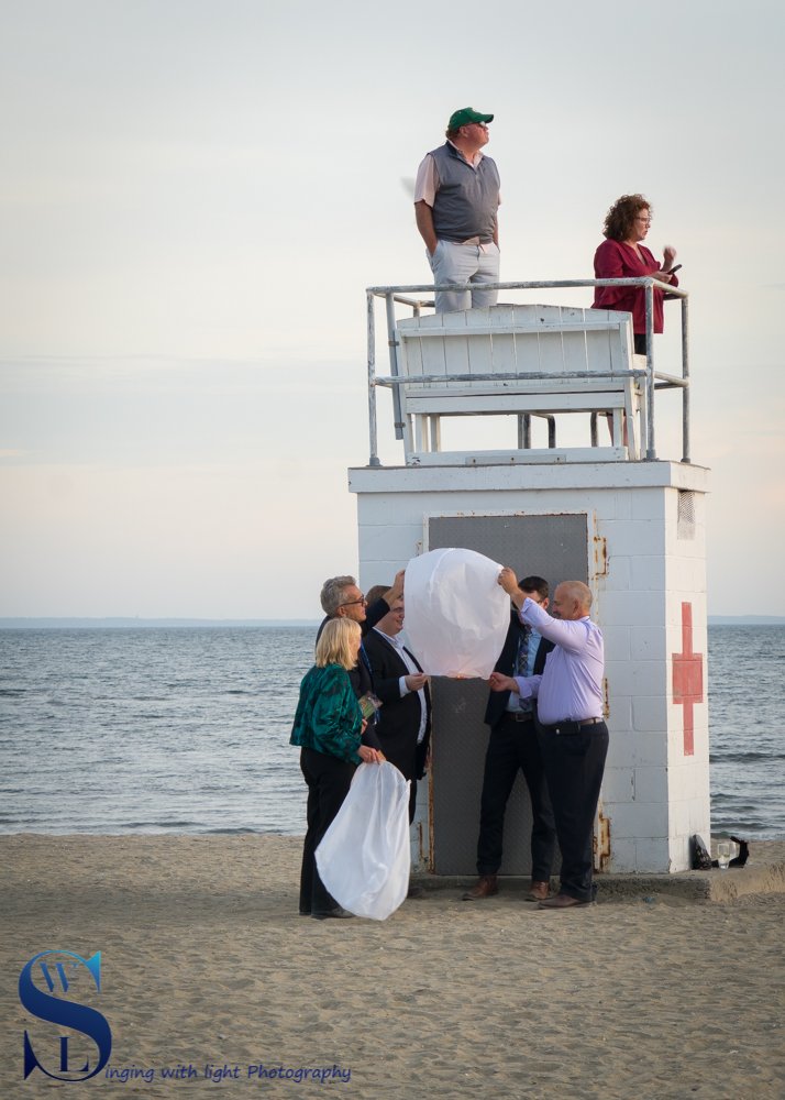 Gulf Beach wedding party and lanterns-4.jpg