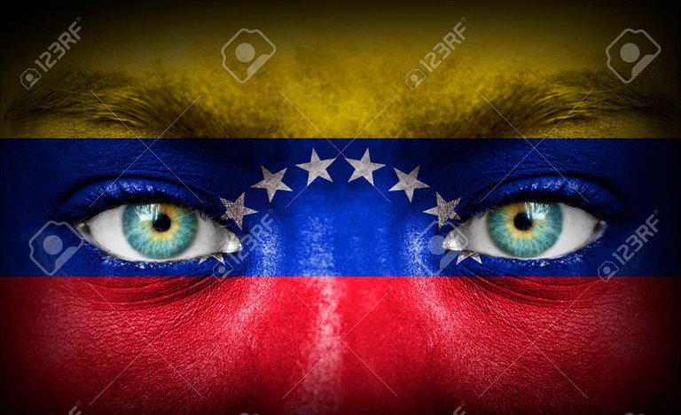 26417034-Human-face-painted-with-flag-of-Venezuela-Stock-Photo.jpg