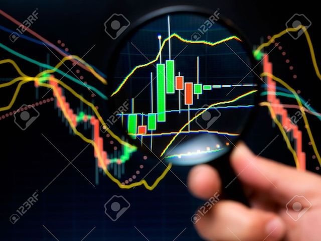 8378281-Magnifier-and-graph-basic-tools-of-technical-analysis-on-the-stock-market-Stock-Photo.jpg