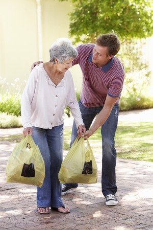 Man_Helping_Woman_Neighbor.jpg