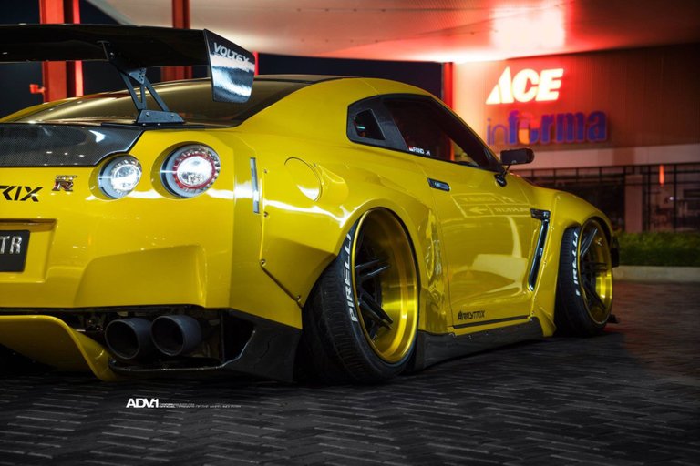 rocketbunny-pandem-nissan-gtr-r35-widebody-carbon-fiber-adv1-concave-wheels-gold-armytrix-j.jpg